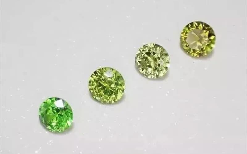 differing shades of demantoid garnet