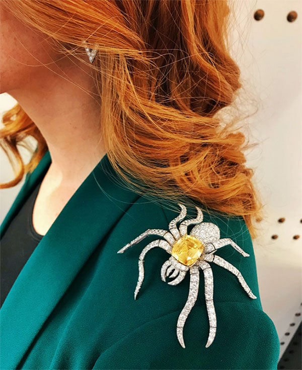 Woman wearing David Webb's Witchful thinking brooch