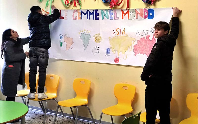 Students hanging poster